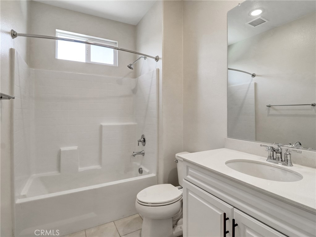 43885 Arancia Way Indio, CA 92203 - Photo 8 of 26 a bathroom with a sink toilet and shower
