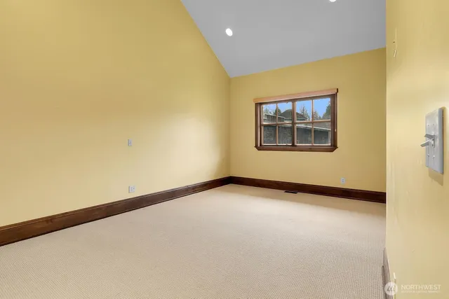 a bathroom with a granite countertop sink mirror toilet and bathtub