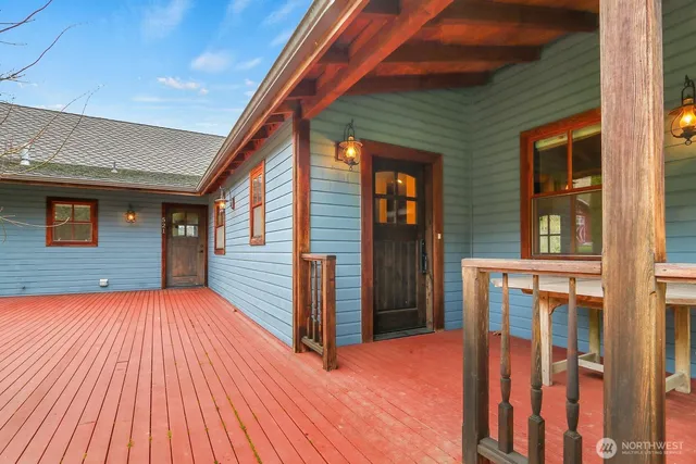 a view of porch with wooden floor and fence