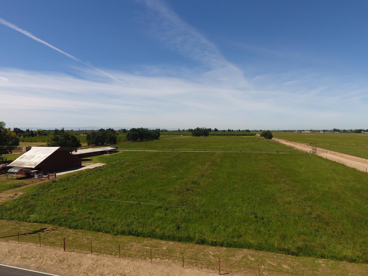 20383 Sutliff Road Escalon, CA 95320 - Photo 13 of 65 a view of a lake with a big yard