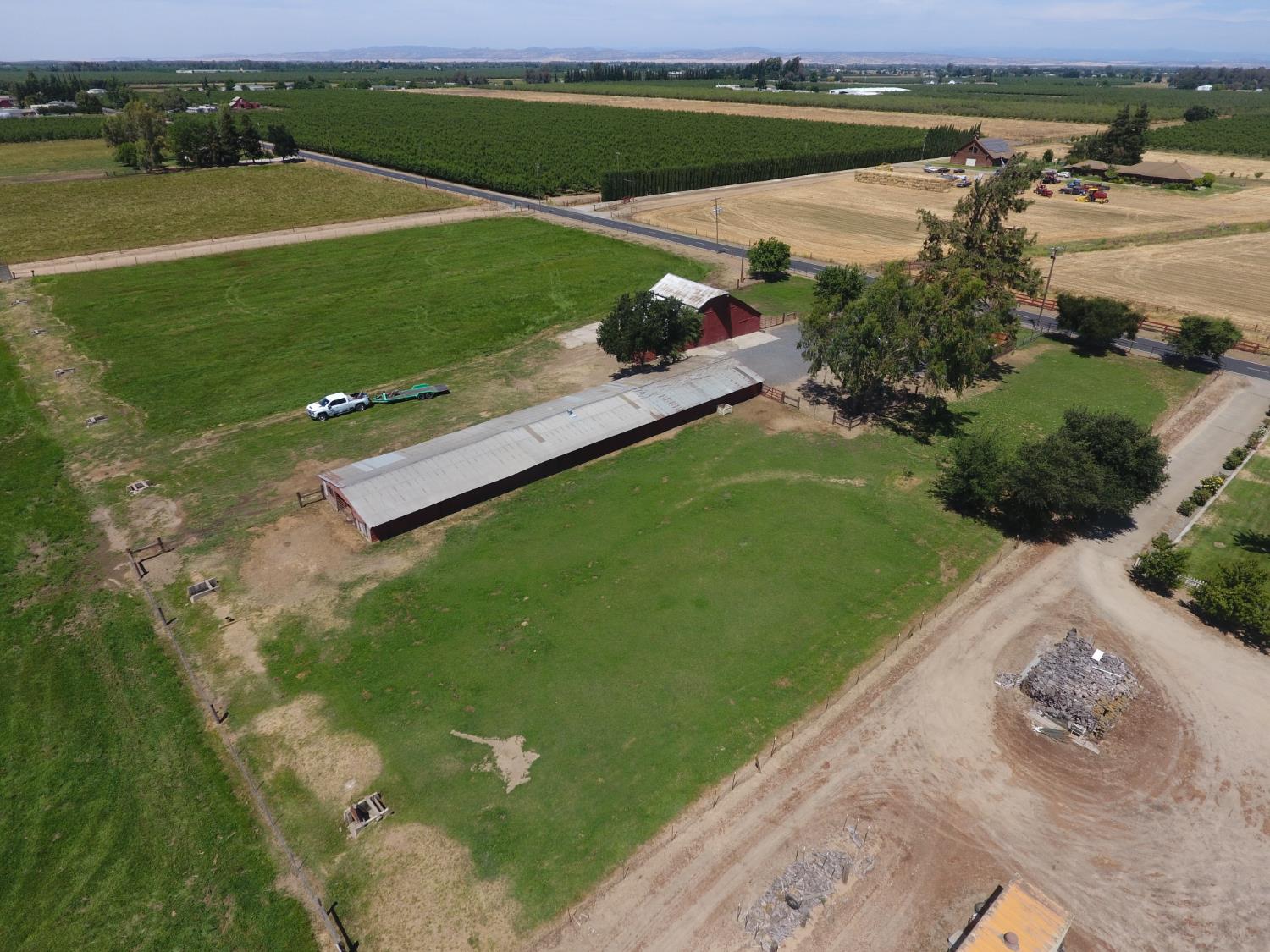 20383 Sutliff Road Escalon, CA 95320 - Photo 56 of 65 an aerial view of a golf course with a lake view