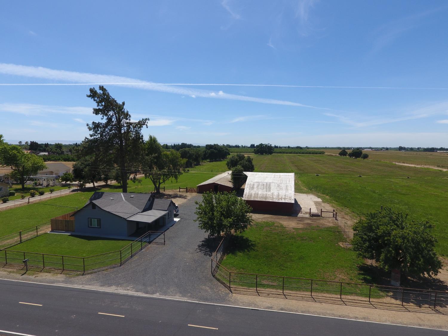 20383 Sutliff Road Escalon, CA 95320 - Photo 59 of 65 a view of a garden and lake view