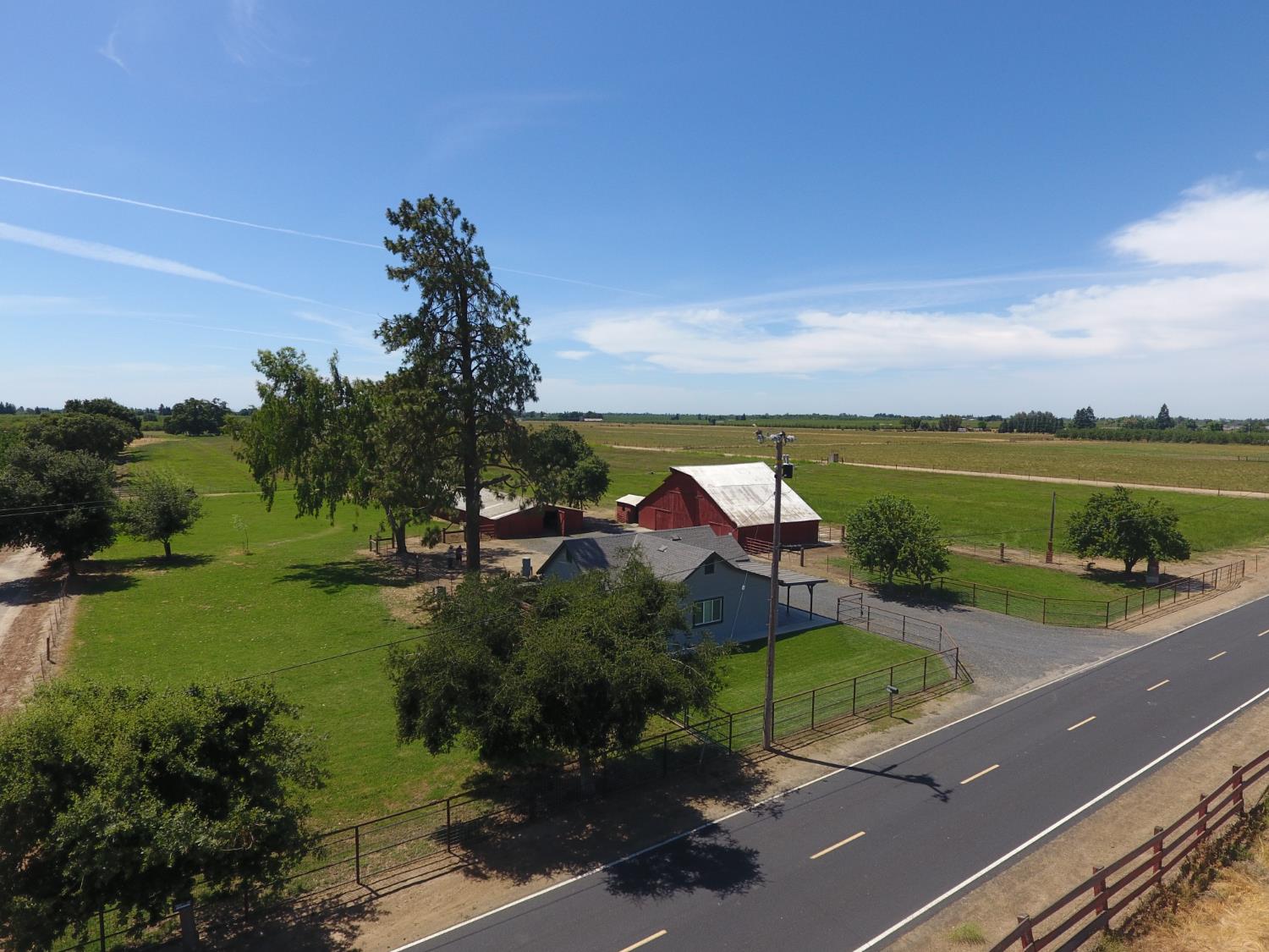 20383 Sutliff Road Escalon, CA 95320 - Photo 60 of 65 a view of a street with a garden