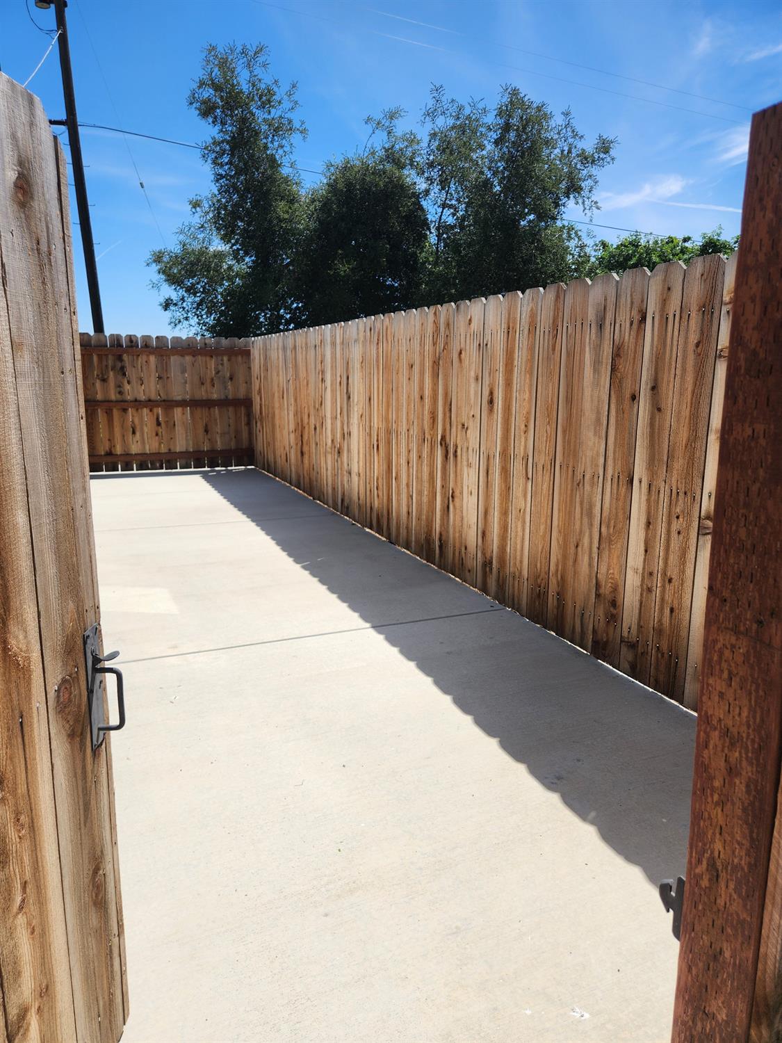 20383 Sutliff Road Escalon, CA 95320 - Photo 7 of 65 a view of a backyard