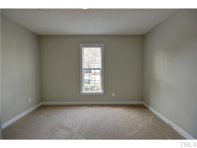 9509 Dawnshire Road Raleigh, NC 27615 - Photo 16 of 24 an empty room with a window