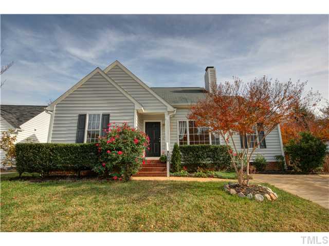 9509 Dawnshire Road Raleigh, NC 27615 - Photo 2 of 24 a front view of a house with a garden