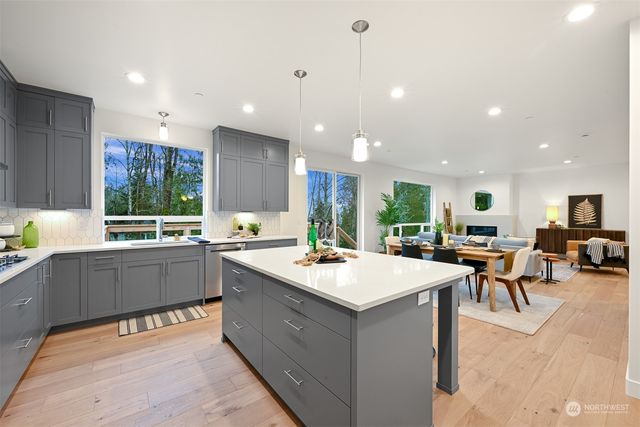 a kitchen with a sink and counter top space