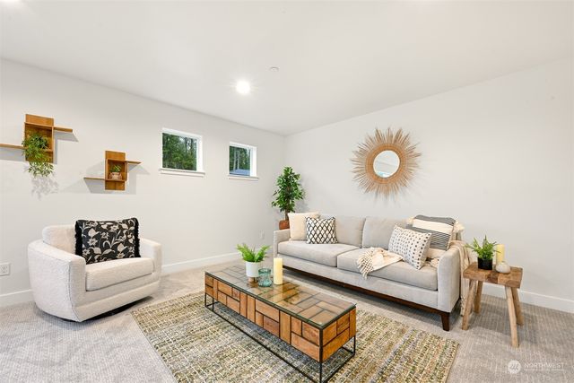 a living room with furniture and a couch