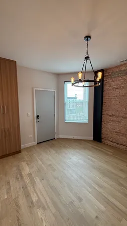 a view of empty room with windows