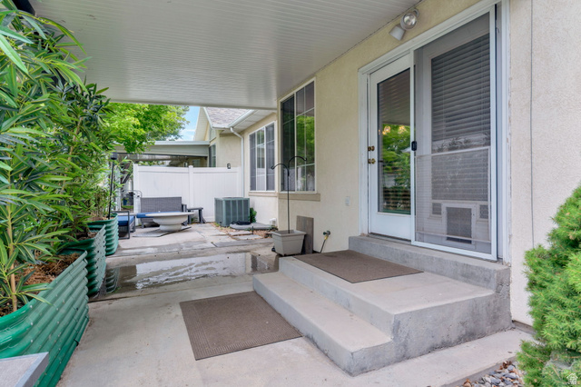 1092 Tithing Ridge Drive Riverton, UT 84065 - Photo 25 of 25 Covered patio with concrete flooring