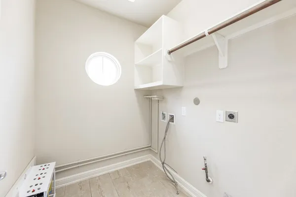 a view of an empty room and window