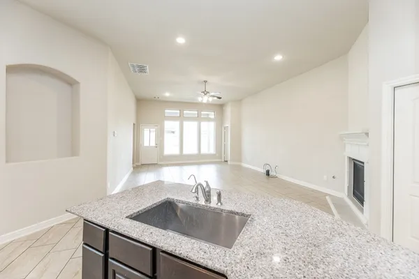 a view of a room with a large window