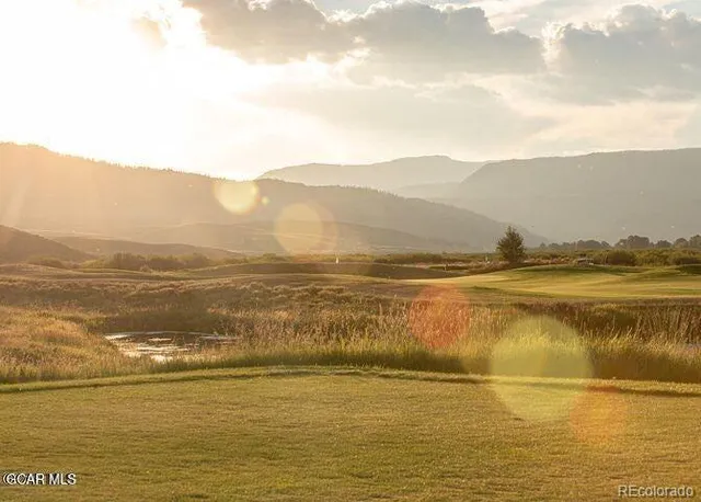 a black and white photo of a living room
