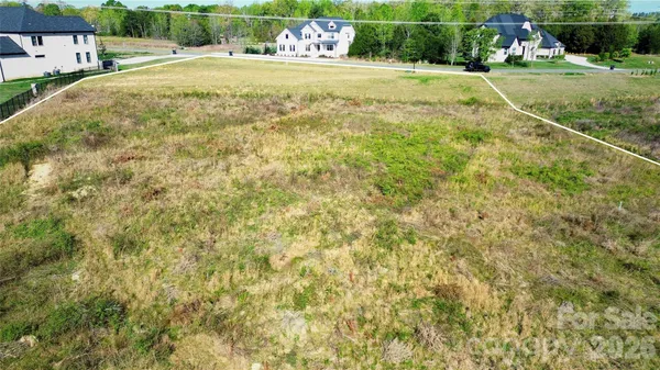 a view of a yard with an outdoor space