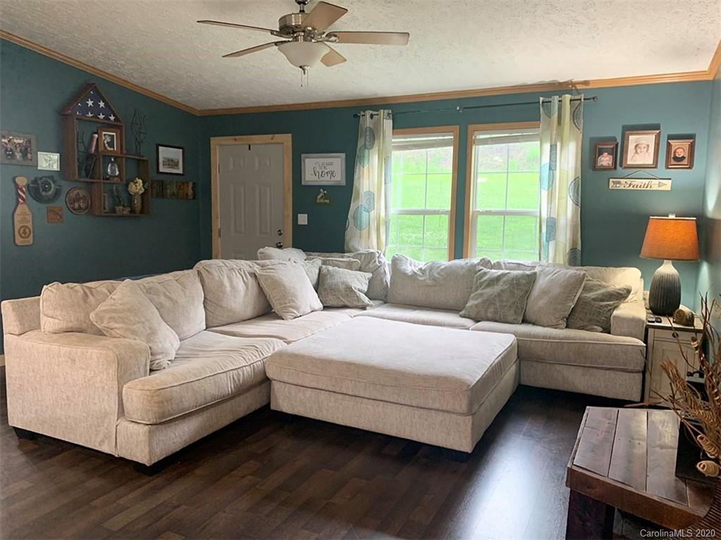 2632 Beaverdam Road Canton, NC 28716 - Photo 2 of 18 a living room with furniture and a large window