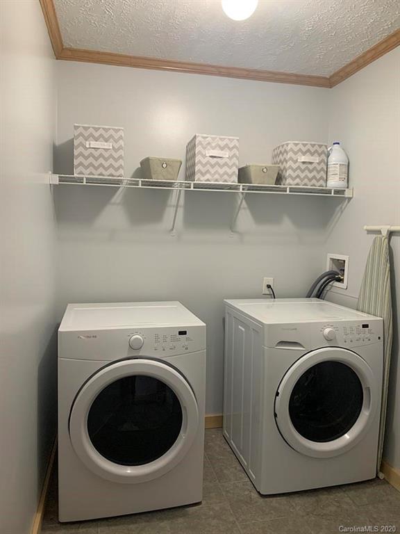 2632 Beaverdam Road Canton, NC 28716 - Photo 17 of 18 a utility room with lots of white appliances