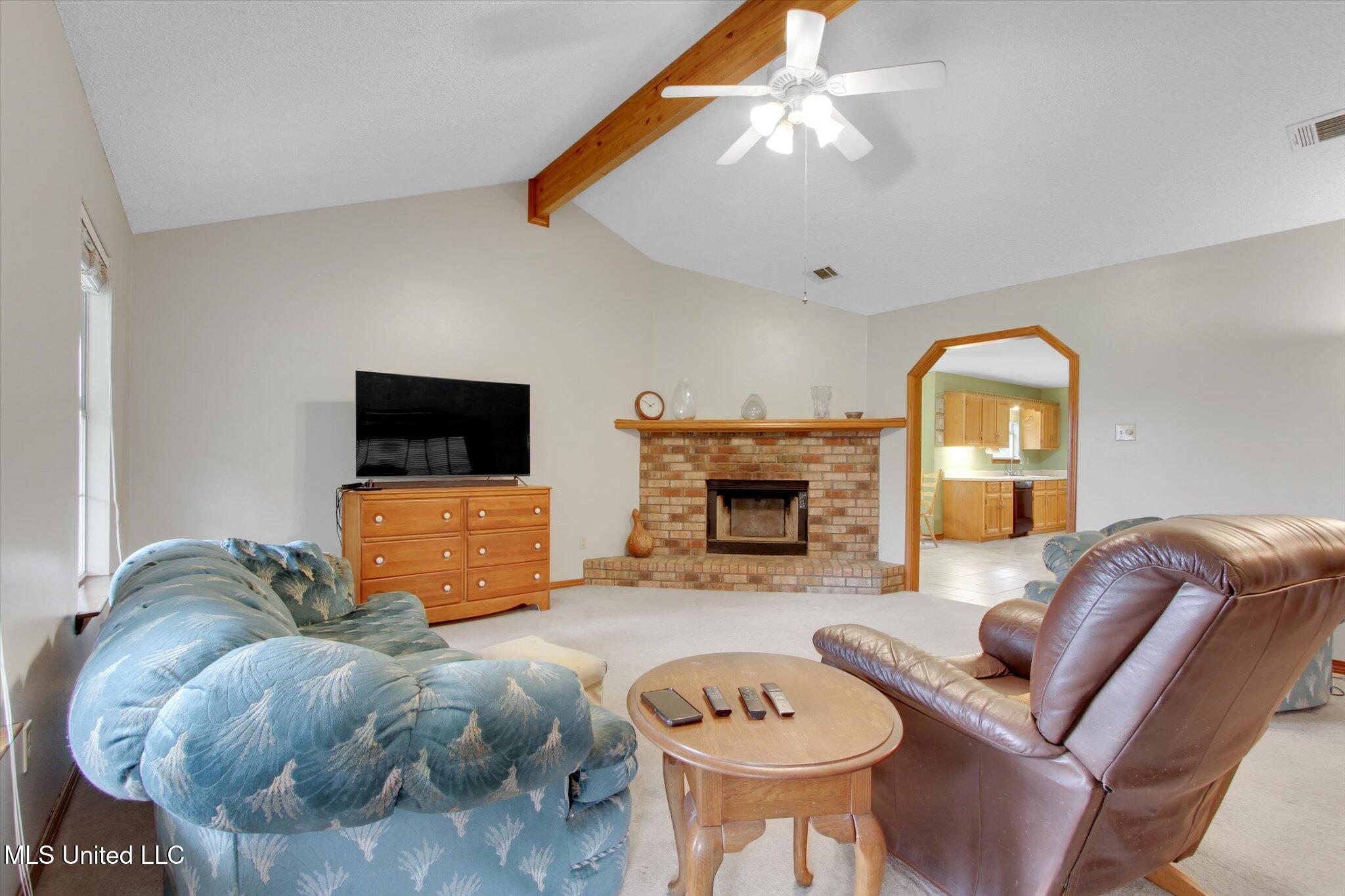 8809 Old Walnut Road Ocean Springs, MS 39564 - Photo 9 of 30 Side view of living room with fireplace