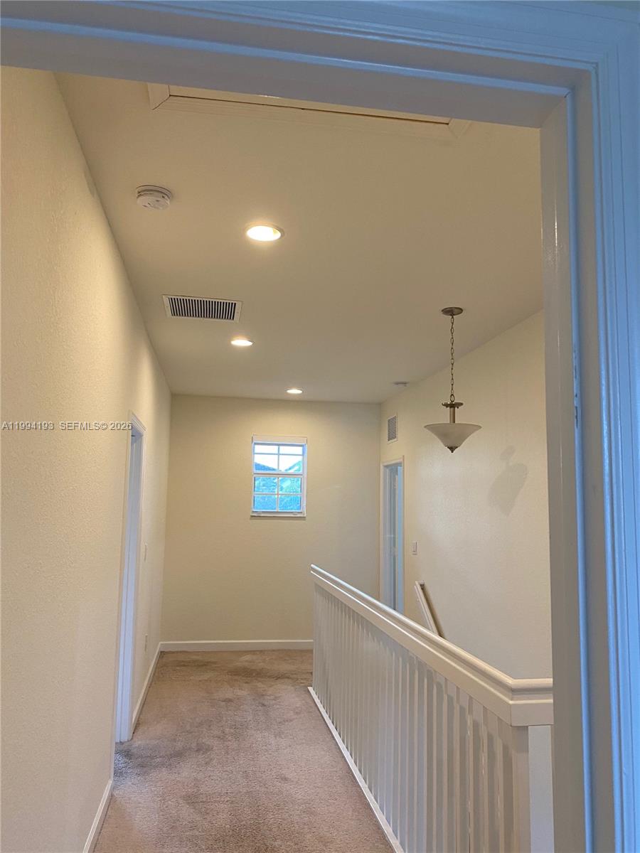 17001 Southwest 90th Terrace, Unit 1 Miami, FL 33196 - Photo 11 of 35 a view of hallway