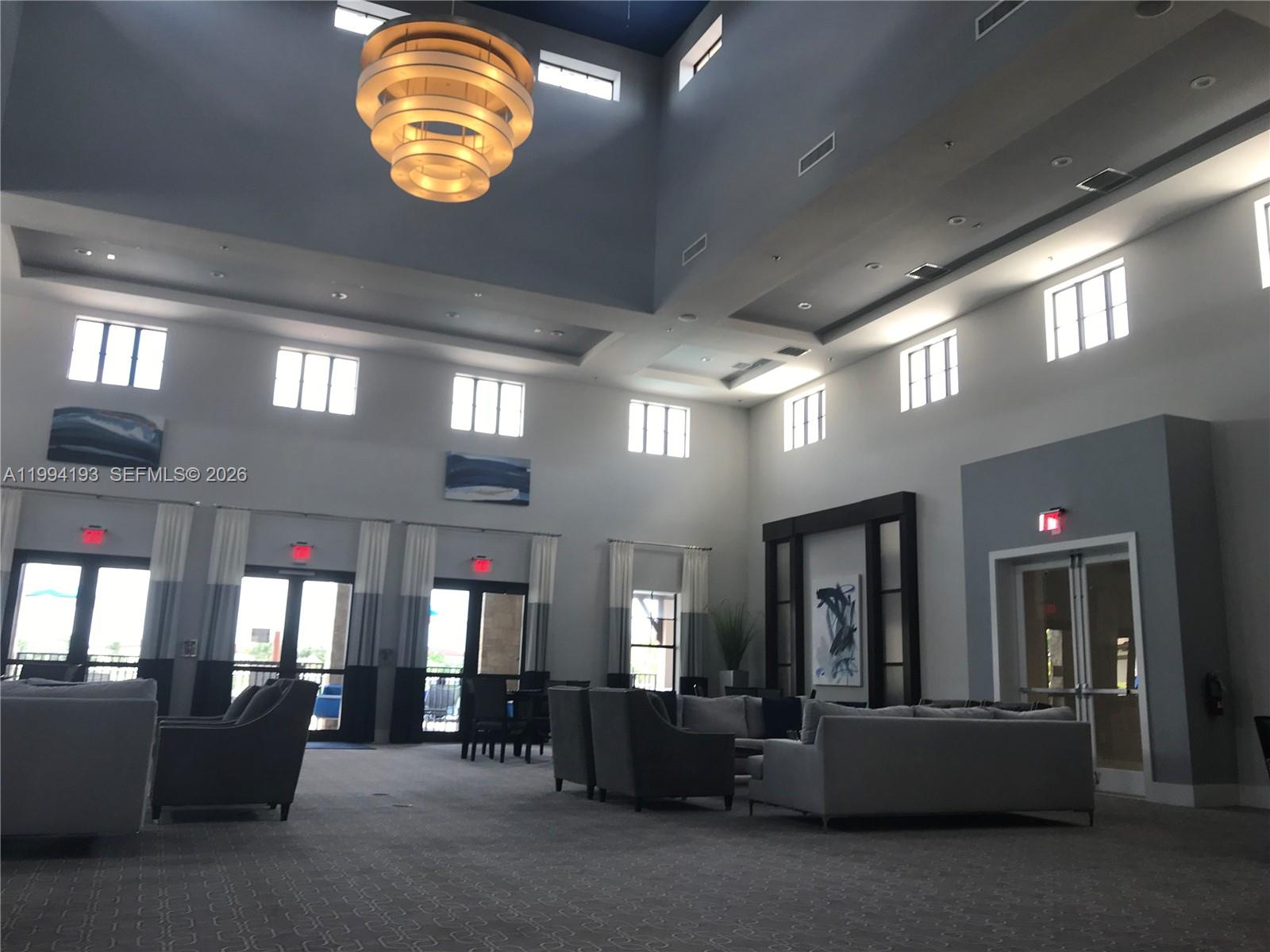 17001 Southwest 90th Terrace, Unit 1 Miami, FL 33196 - Photo 24 of 35 a view of a lobby with furniture