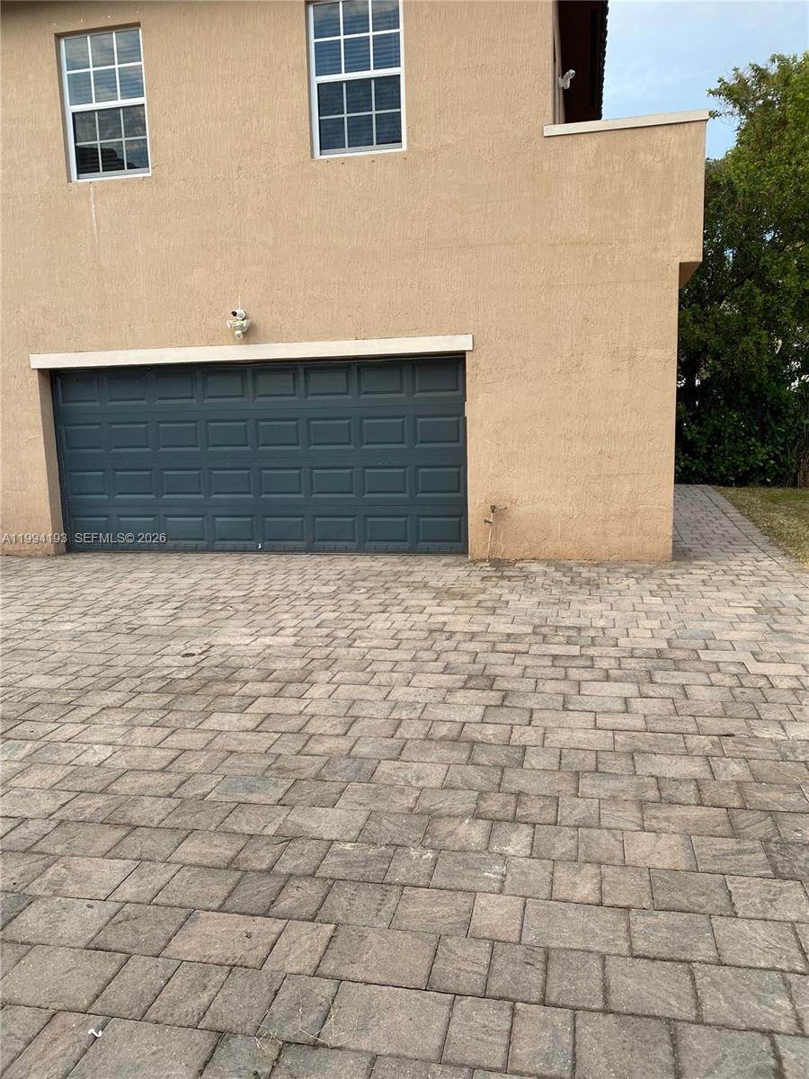 17001 Southwest 90th Terrace, Unit 1 Miami, FL 33196 - Photo 4 of 35 a view of front door