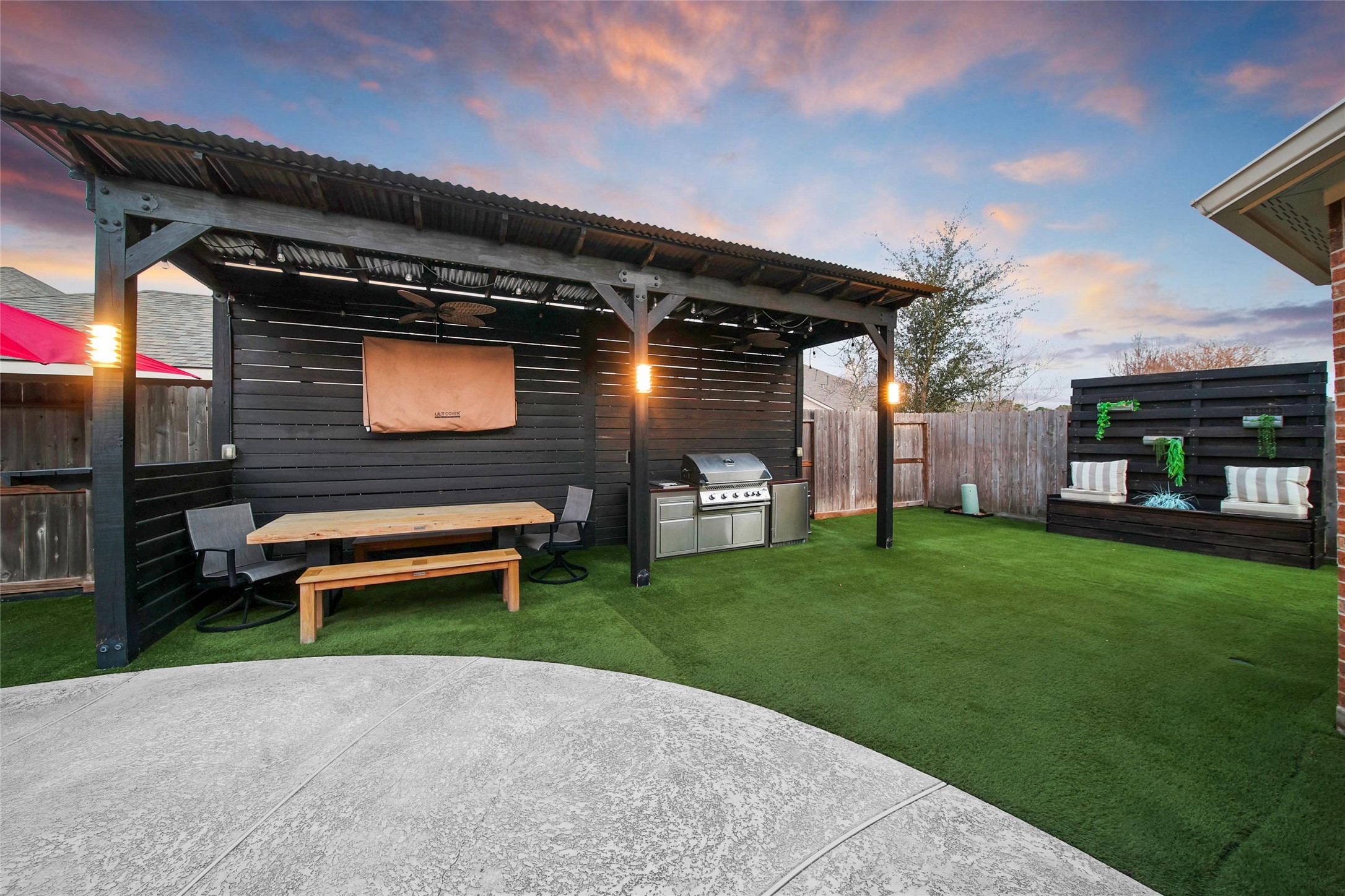 20730 Windrose Bend Drive Spring, TX 77379 - Photo 13 of 50 a backyard of a house with barbeque oven table and chairs