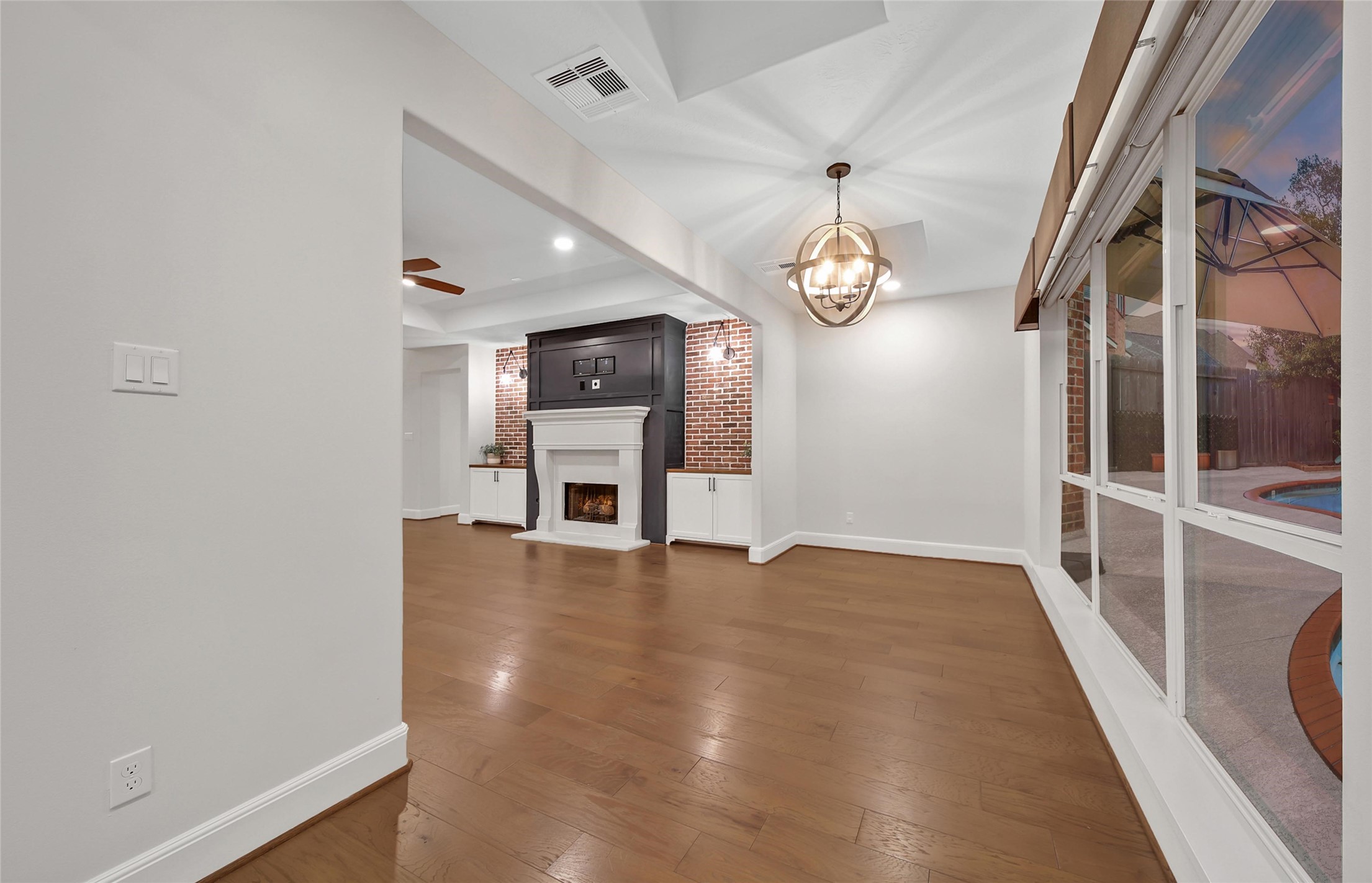 20730 Windrose Bend Drive Spring, TX 77379 - Photo 25 of 50 wooden floor in an empty room with a window