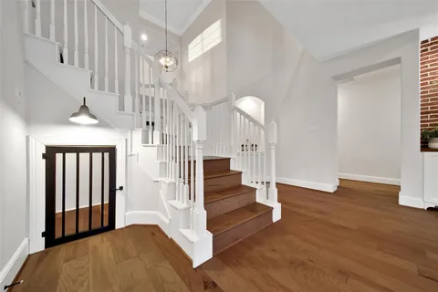 a view of entryway with wooden floor