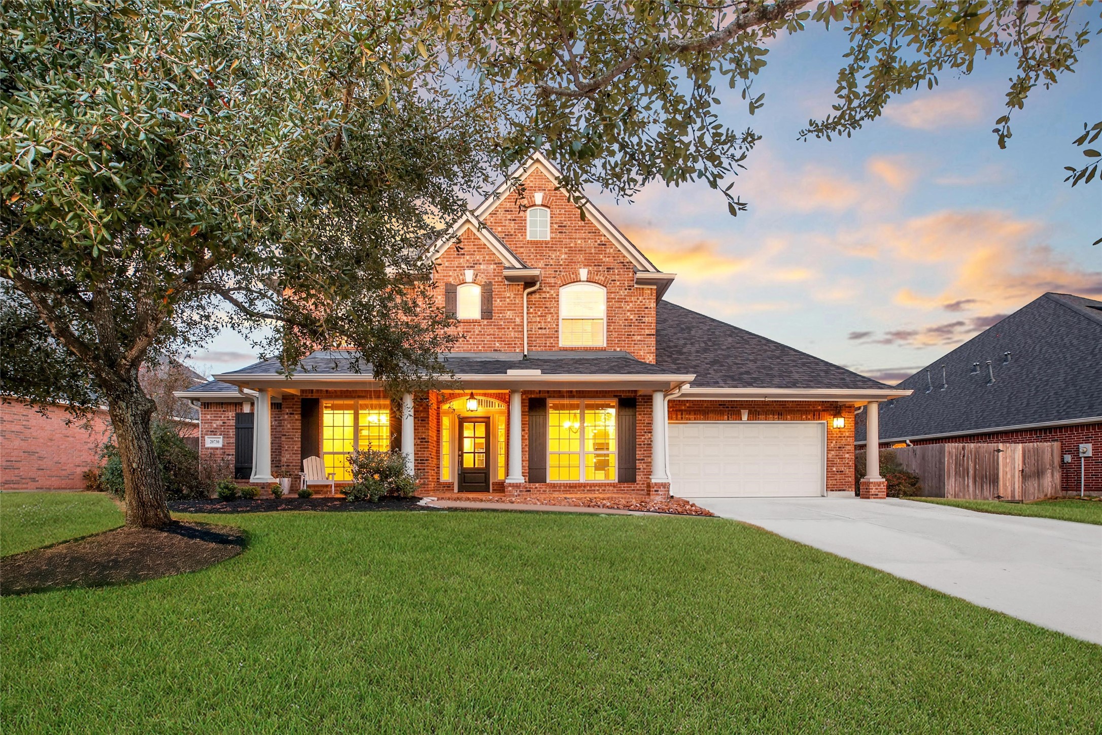 20730 Windrose Bend Drive Spring, TX 77379 - Photo 39 of 50 a front view of a house with a yard and trees
