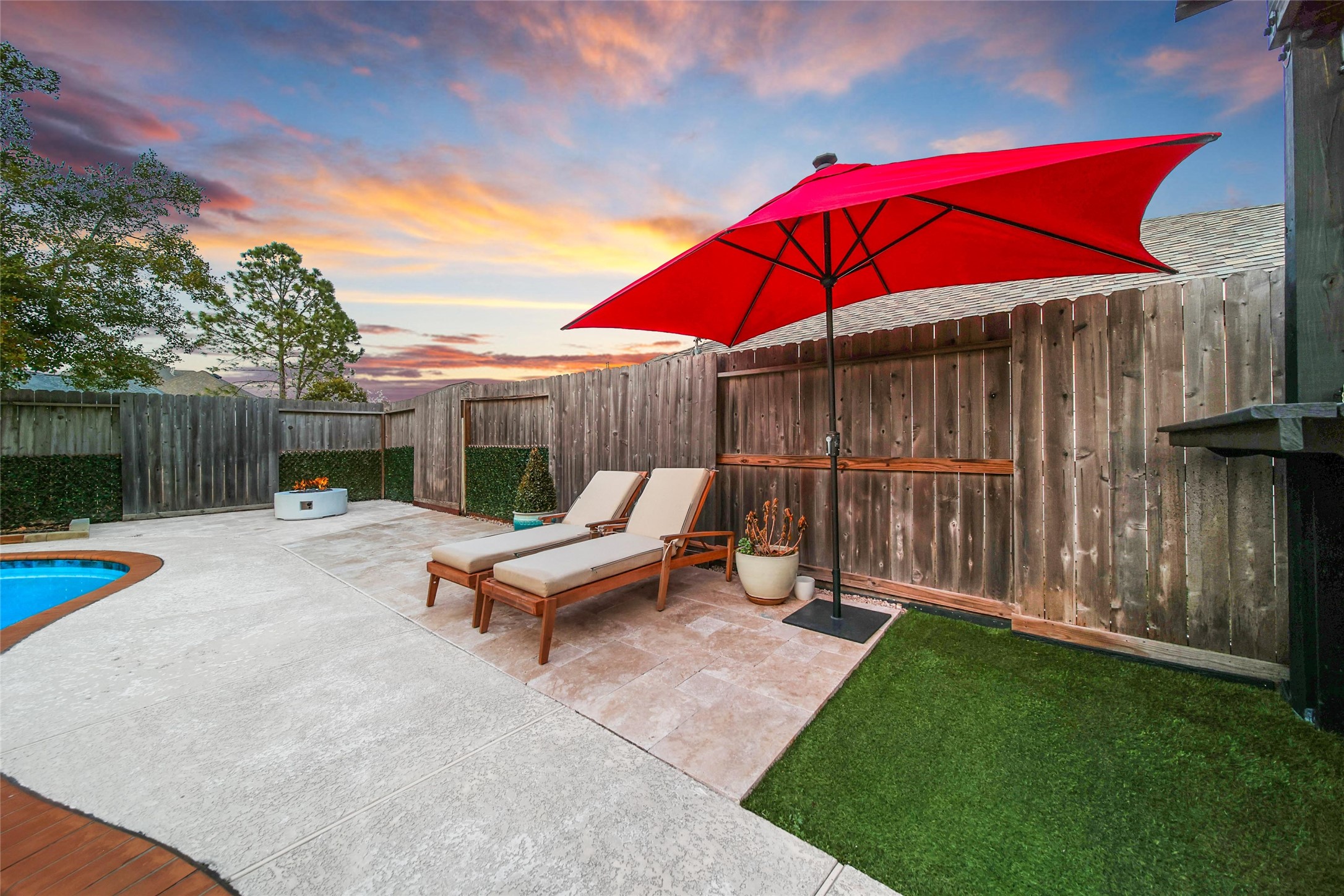 20730 Windrose Bend Drive Spring, TX 77379 - Photo 42 of 50 a view of backyard with swimming pool and outdoor seating