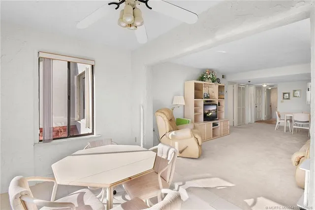 a kitchen with cabinets appliances and a sink
