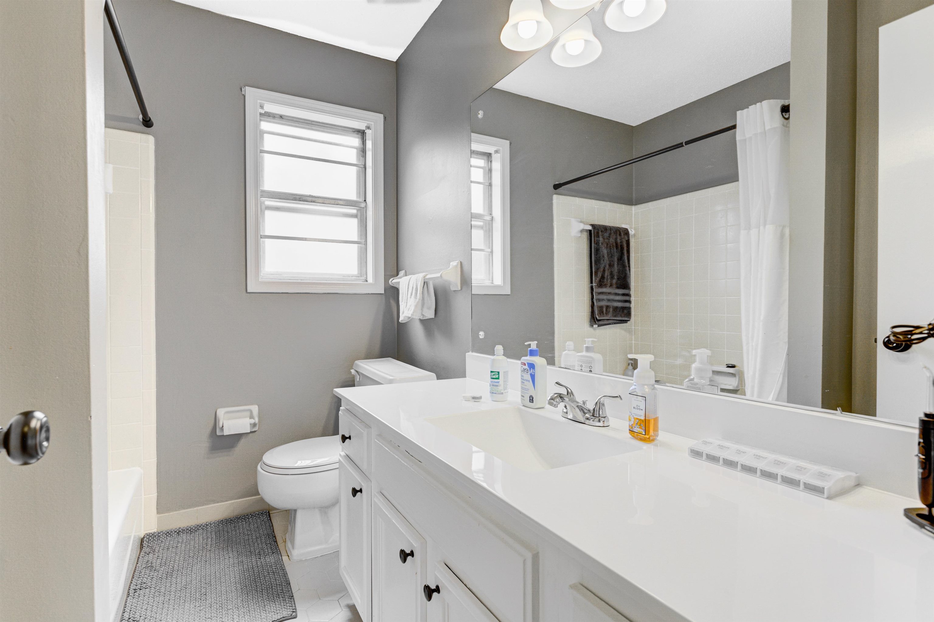 3224 Court Street Bartlett, TN 38134 - Photo 14 of 23 a bathroom with a toilet sink and mirror
