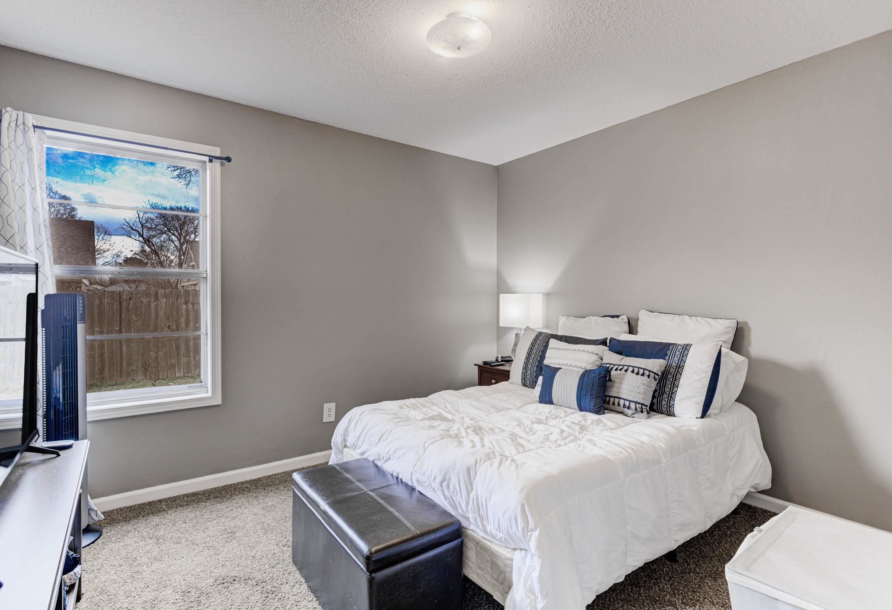 3224 Court Street Bartlett, TN 38134 - Photo 16 of 23 a bedroom with a bed and a window