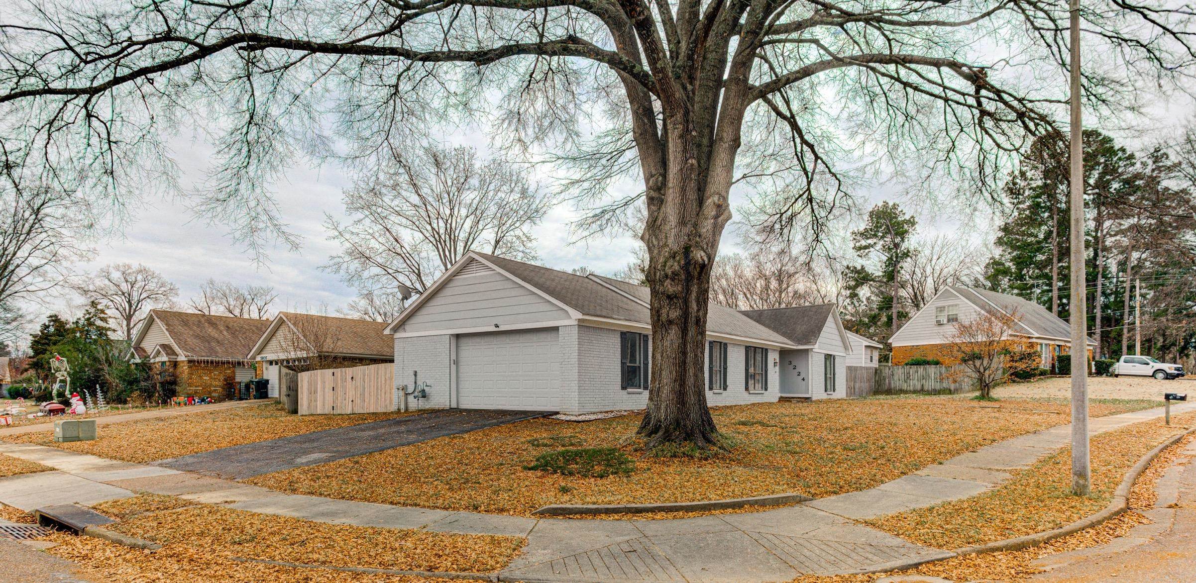 3224 Court Street Bartlett, TN 38134 - Photo 2 of 23 a view of a house with snow on the road