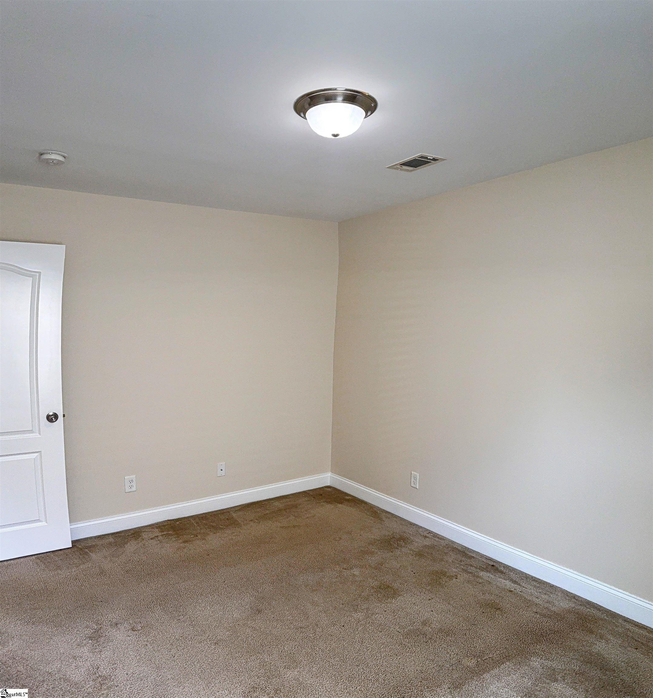 207 Penrith Court Simpsonville, SC 29681 - Photo 12 of 23 This photo was taken before the Brand New Carpets and blinds were installed in all the bedrooms.