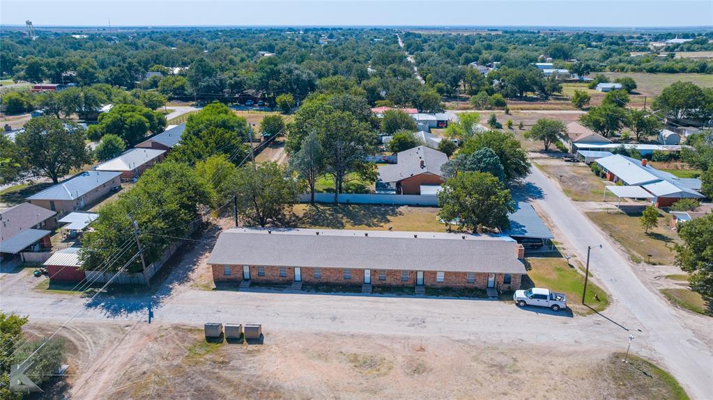 604 North 3rd Street Haskell, TX 79521 - Photo 15 of 19 an aerial view of a house with a garden and lake view