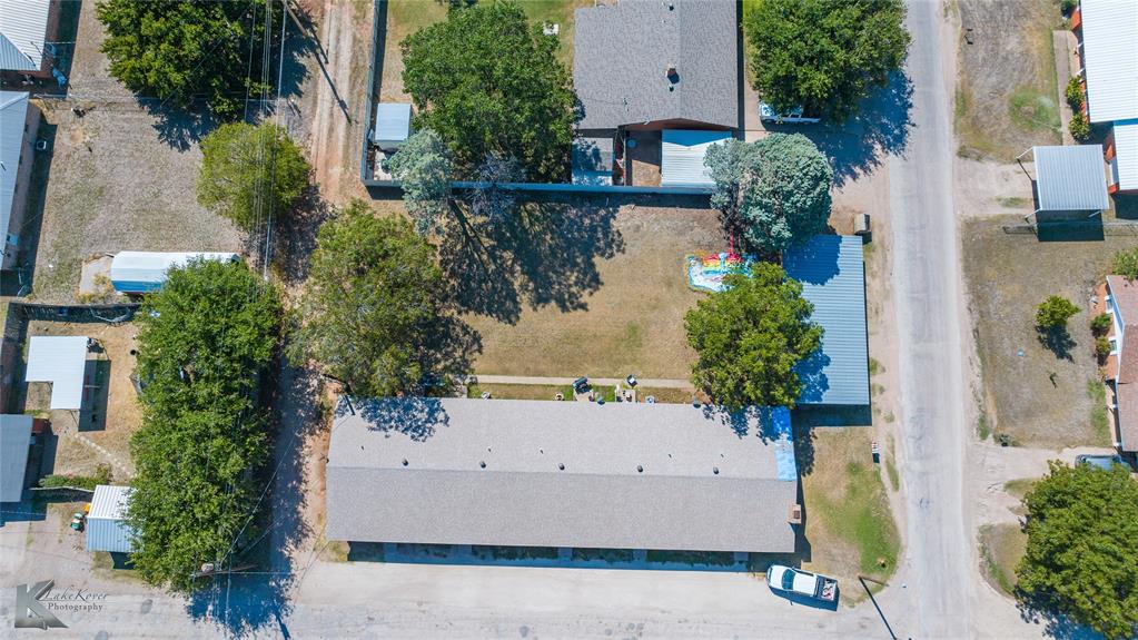 604 North 3rd Street Haskell, TX 79521 - Photo 19 of 19 an aerial view of a house with swimming pool