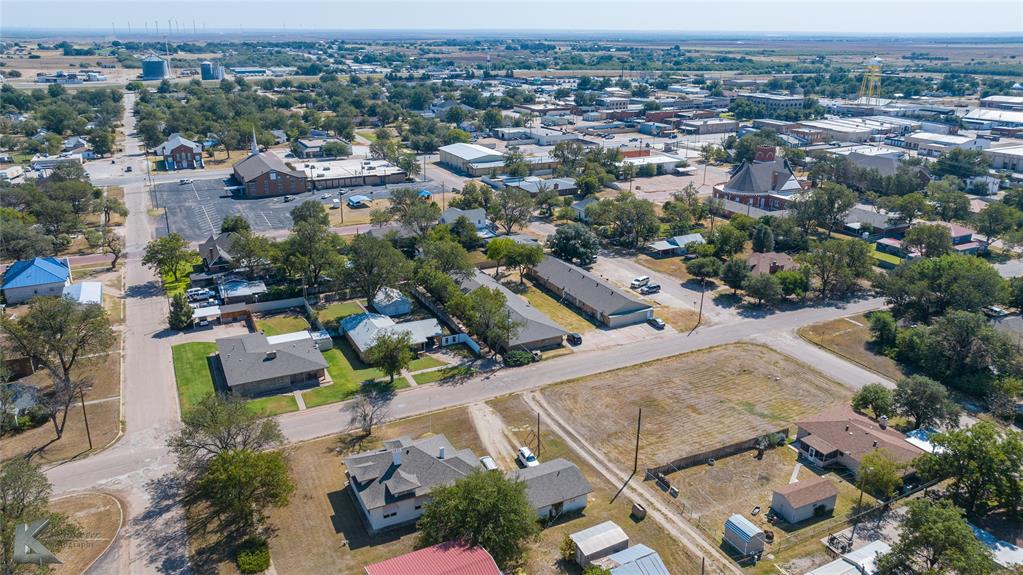 604 North 3rd Street Haskell, TX 79521 - Photo 3 of 19 an aerial view of residential houses with outdoor space