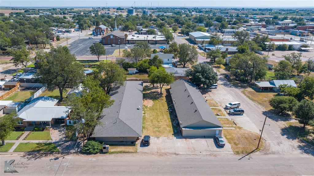 604 North 3rd Street Haskell, TX 79521 - Photo 5 of 19 an aerial view of residential houses with outdoor space and parking