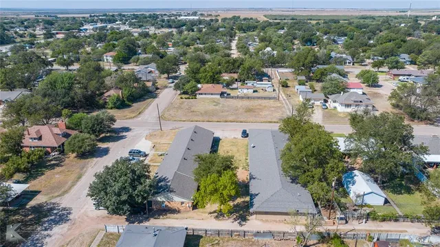 an aerial view of a city with lots of residential buildings