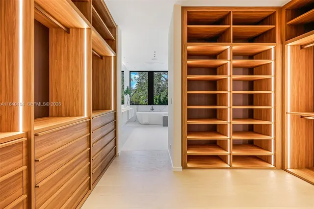 a view of front door with wooden door