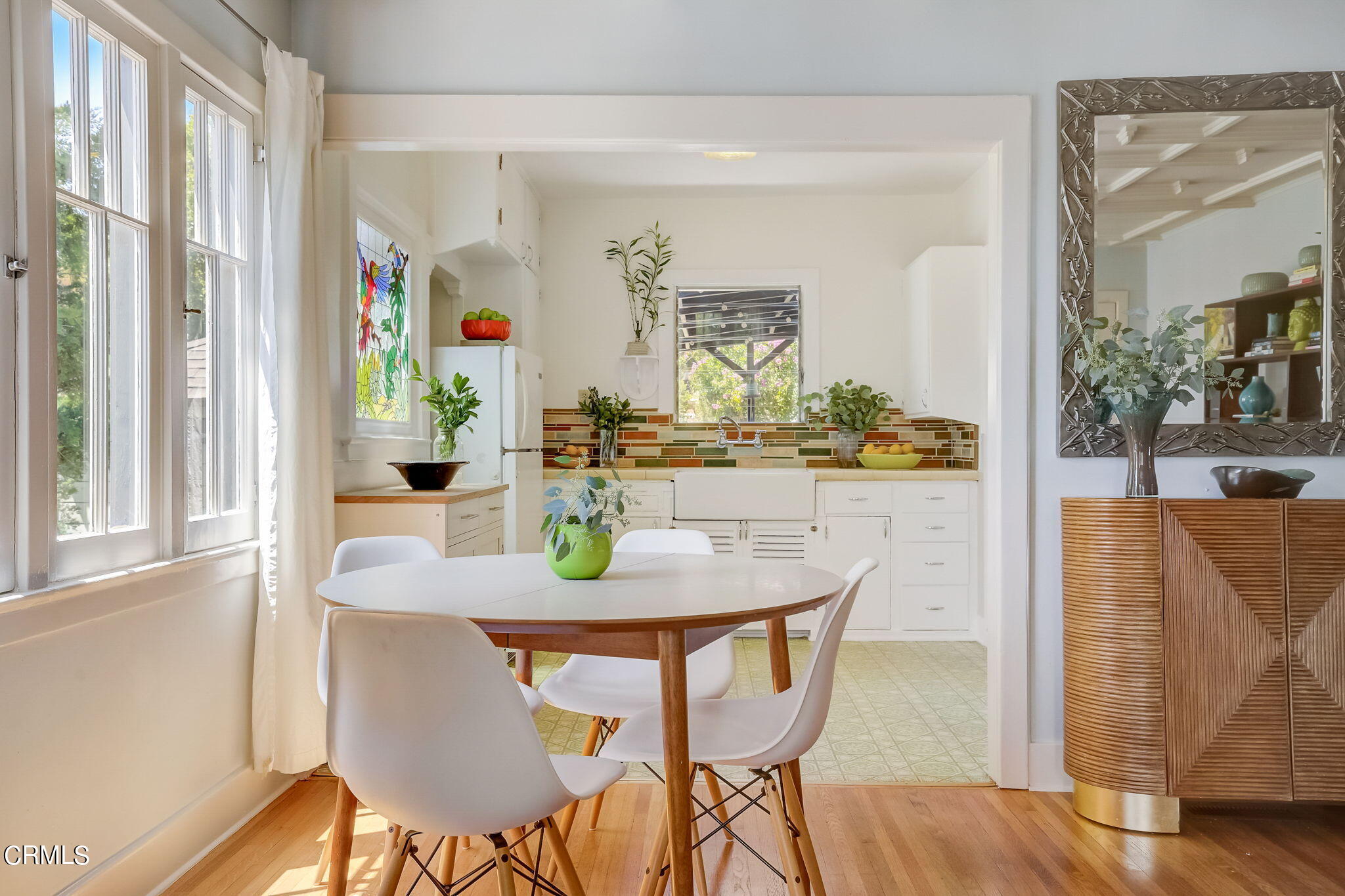 6201 Oak Crest Way Los Angeles, CA 90042 - Photo 10 of 37 a view of a dining room with furniture and wooden floor