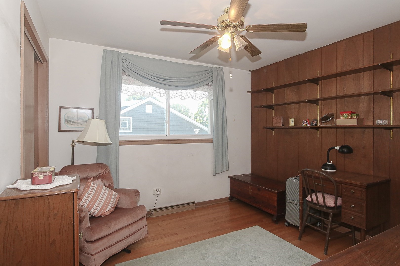 300 South We Go Trail Mount Prospect, IL 60056 - Photo 13 of 27 a bedroom with a bed and a chandelier