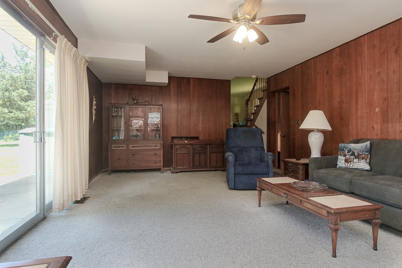 300 South We Go Trail Mount Prospect, IL 60056 - Photo 20 of 27 a living room with furniture and a chandelier