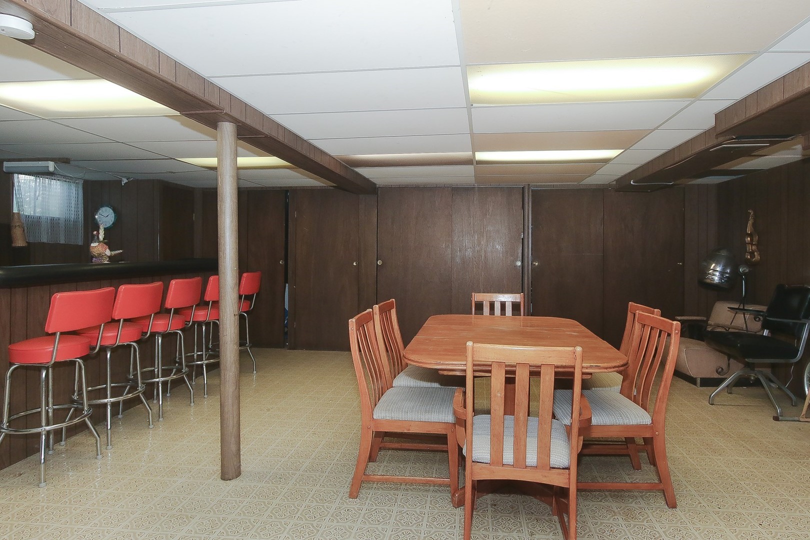 300 South We Go Trail Mount Prospect, IL 60056 - Photo 22 of 27 a dining room with a wooden table and chairs