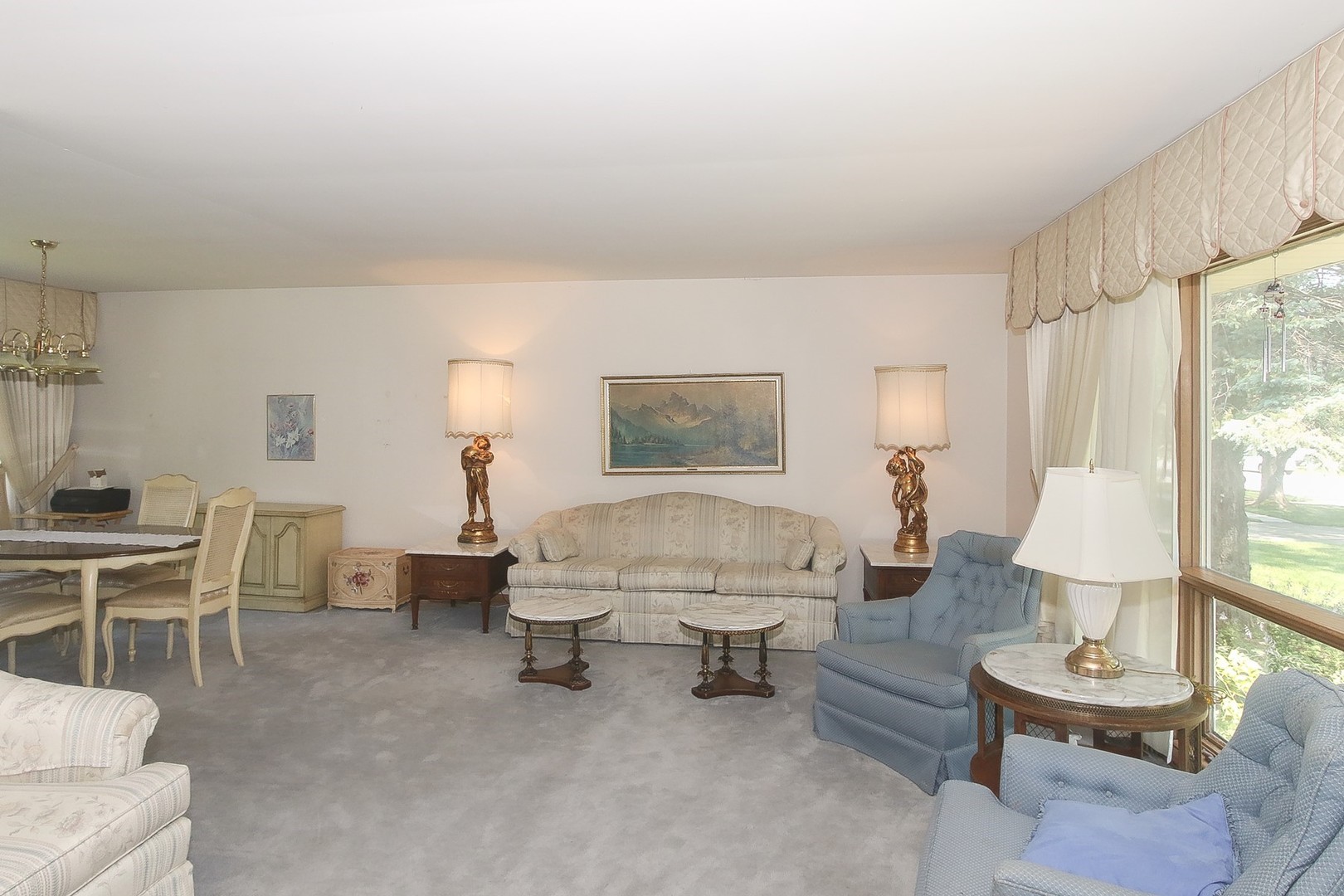 300 South We Go Trail Mount Prospect, IL 60056 - Photo 5 of 27 a living room with furniture a lamp a table and a lamp