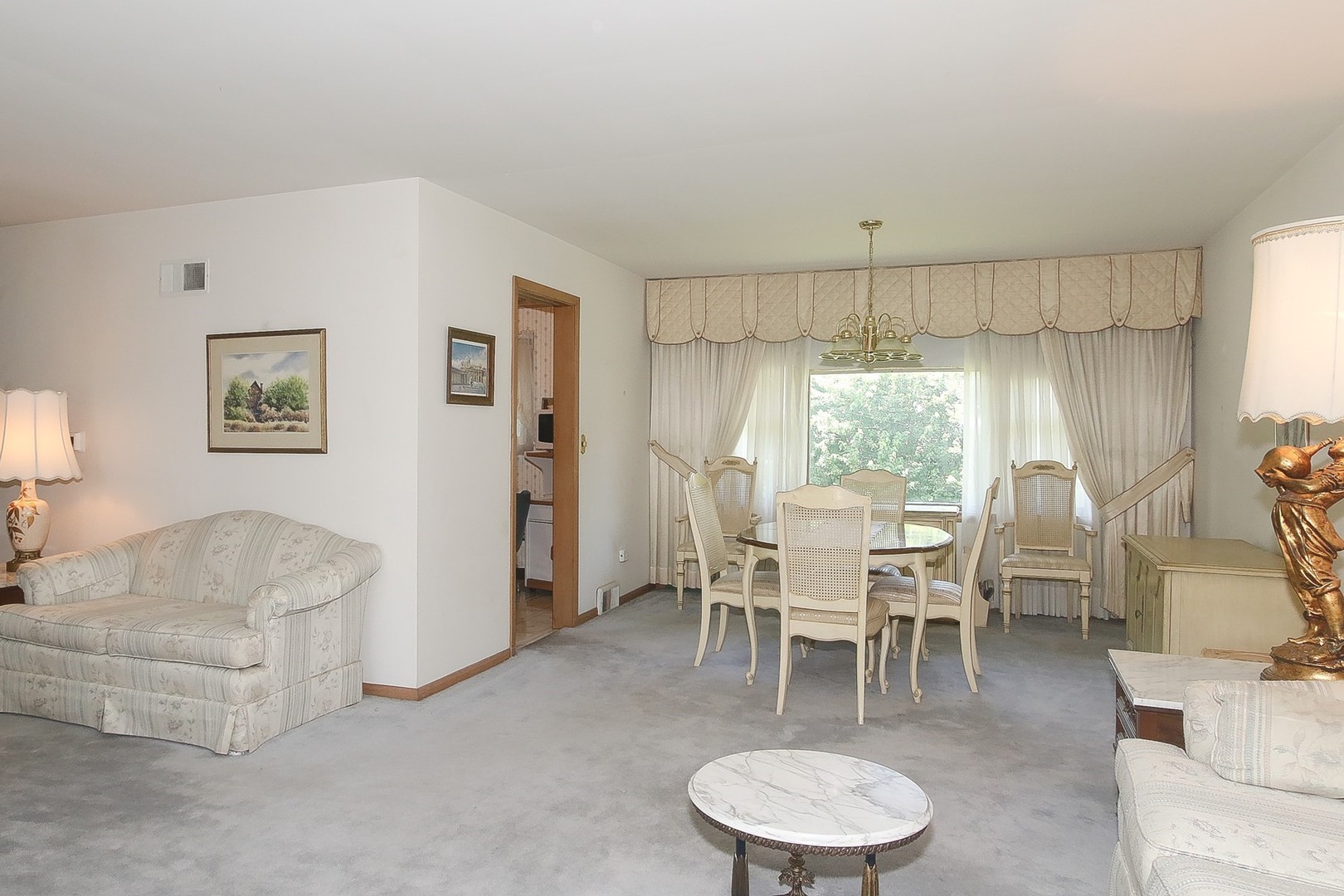 300 South We Go Trail Mount Prospect, IL 60056 - Photo 7 of 27 a dining room with furniture and a large window