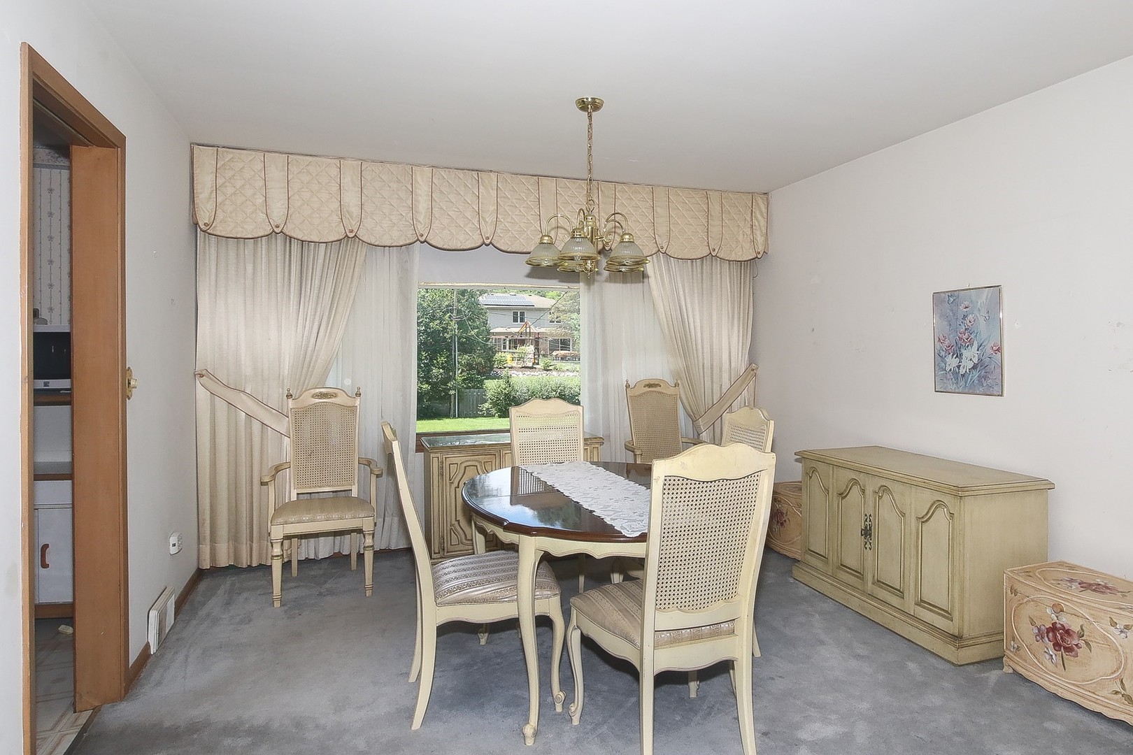 300 South We Go Trail Mount Prospect, IL 60056 - Photo 9 of 27 a view of a dining room with furniture window and outside view