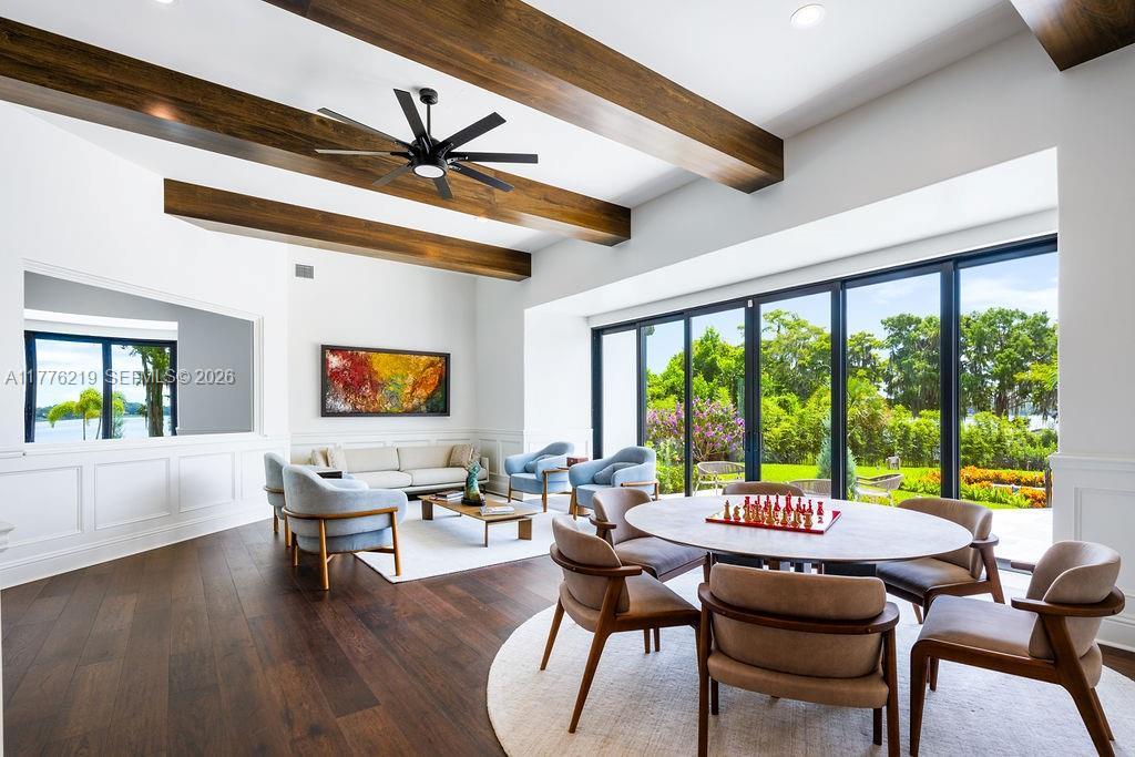 570 Manor Road Maitland, FL 32751 - Photo 22 of 100 a living room with furniture and a large window