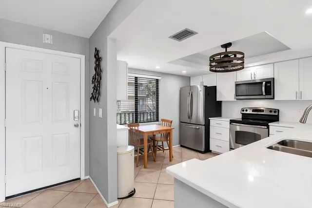 $375,000 | 5250 Fox Hollow Drive, Unit 522, Naples, FL 34104