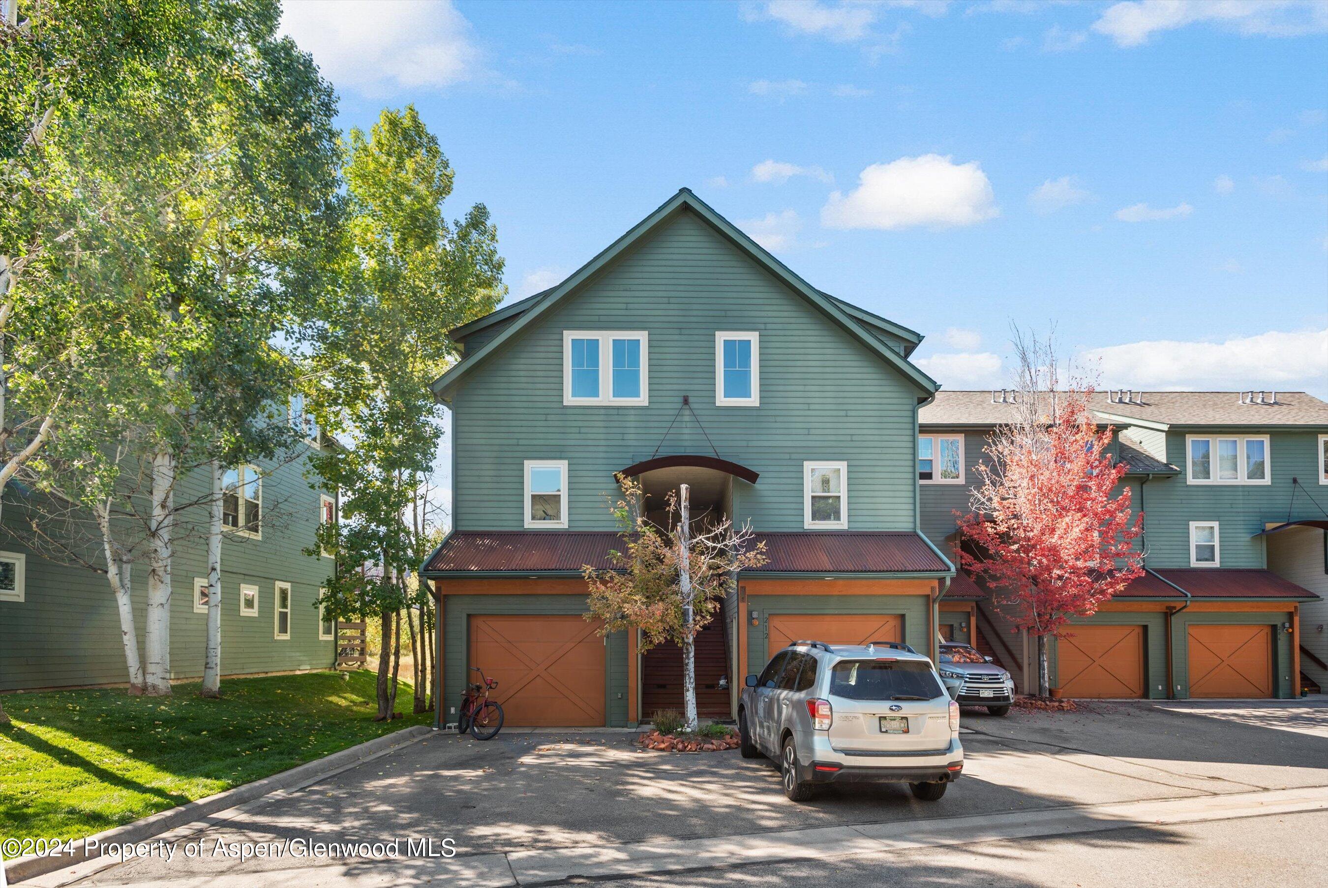 214 Lakeside Drive Basalt, CO 81621 - Photo 22 of 31 a car parked in front of house